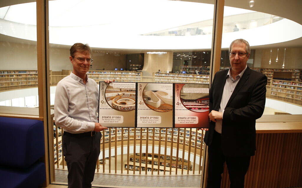 PHOTO CAP: Pictured with stamp set at left: David Laron, CEO, Israel Post; at right: Oren Weinberg, CEO, The National Library of Israel. (Photo: Uri Bareket).