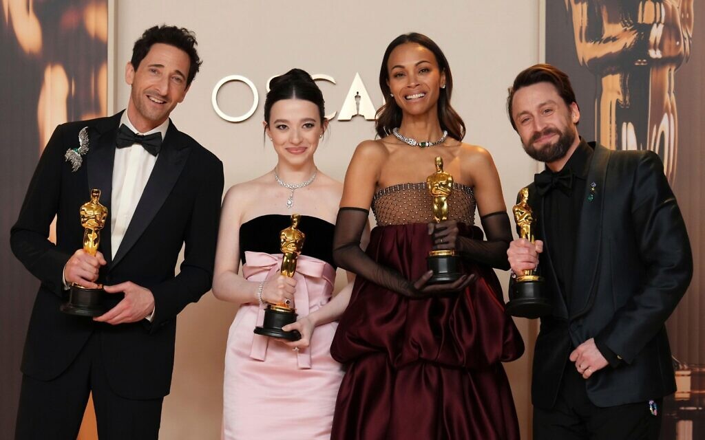 Adrien Brody, from left, winner of the award for best performance by an actor in a leading role for "The Brutalist," Mikey Madison, winner of the award for best performance by an actress in a leading role for "Anora," Zoe Saldana, winner of the award for best performance by an actress in a supporting role for "Emilia Perez," and Kieran Culkin, winner of the award for best performance by an actor in a supporting role for "A Real Pain,"