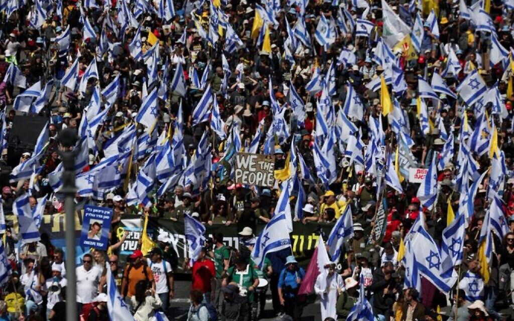 Protestors block the main entrance to Jerusalem, as they head towards Netanyahu's residence