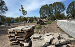 Gravestones delivered to the cemetery next to the embrace wall of the memorial. Pic: The Together Plan
