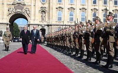 Hungary's Prime Minister Viktor Orban (L) and Prime Minister Benjamin Netanyahu are greeted by a military honor guard on April 3, 2025 in Budapest, Hungary. (Avi Ohayon / GPO)