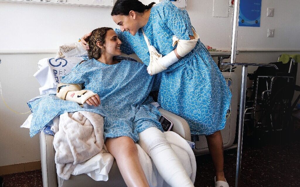Emily Damari, 28, a British-Israeli from Kfar Aza, and Romi Gonen, 24, from Kfar Vradim