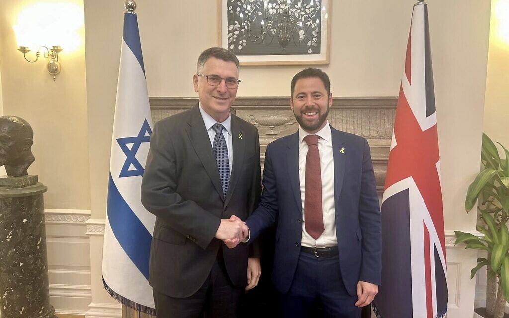 Gideon Moshe Sa'ar, Israel's Foreign Minister, left with Phil Rosenberg, President, Board of Deputies of British Jews, right.