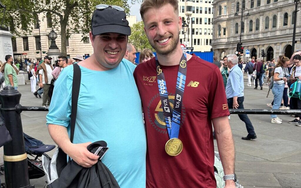 Runner James Gordon with Marcus Bean who is supported by Kisharon Langdon