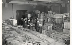 Leaders of the New York-based YIVO open crates of salvaged YIVO treasures from Europe. New Jersey, 1947. Credit: YIVO Institute for Jewish Research Leaders of the New York-based YIVO open crates of salvaged YIVO treasures from Europe. New Jersey, 1947. Credit: YIVO Institute for Jewish Research