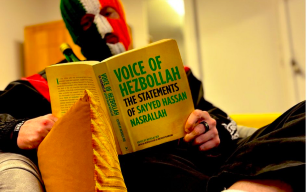 Member of Kneecap posts image online reading Hezbollah book