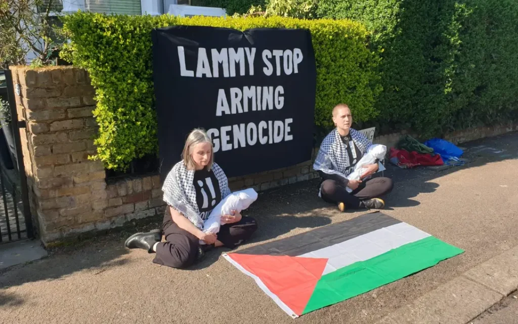 Two Youth Demand activists outside the North London home of David Lammy