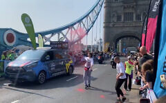 Protestors against the war in Gaza throw red paint on Tower Bridge during the London Marathon Protestors against the war in Gaza throw red paint on Tower Bridge during the London Marathon