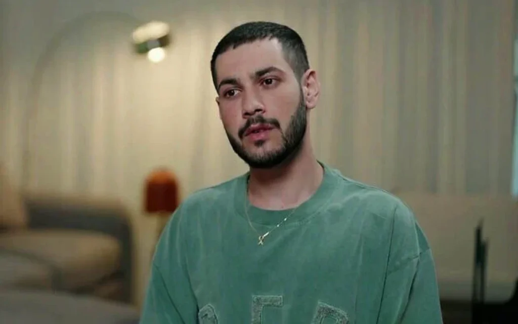 Released hostage Eliya Cohen speaks to Channel 12 in the first interview he has given since he was released from Hamas captivity in February (Screen capture, Channel 12)