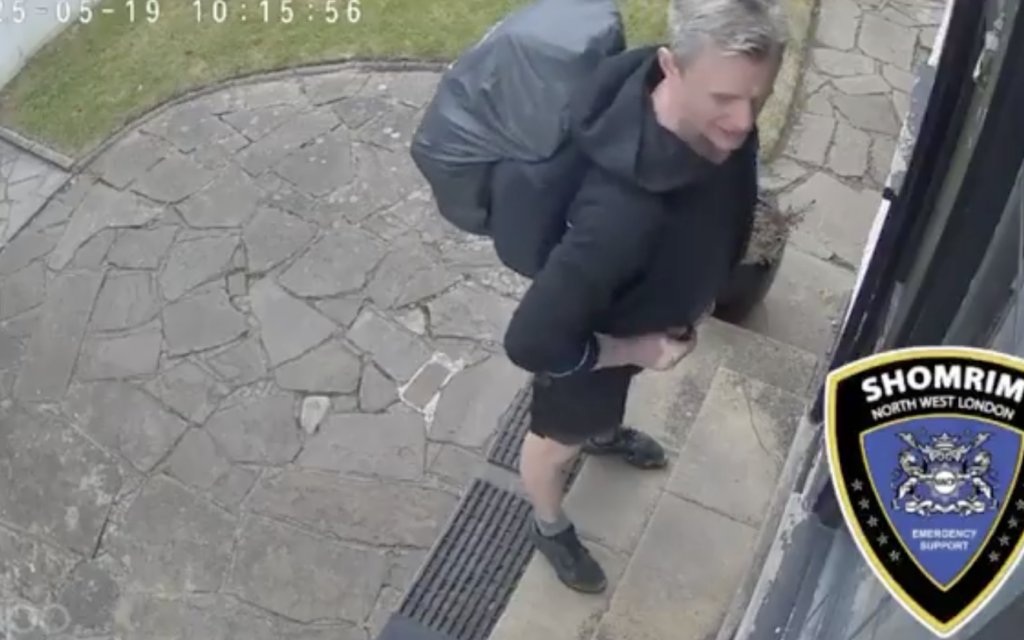 CCTV footage shows a man outside a Jewish home in Golders Green shortly before a mezuzah was allegedly removed. Photo Credit: Shomrim North West London