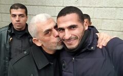 Hamas leader Yahya Sinwar embraces freelance journalist Hassan Eslaiah in a photo circulated by watchdog group Honest Reporting. Photo Credit:
Honest Reporting/X