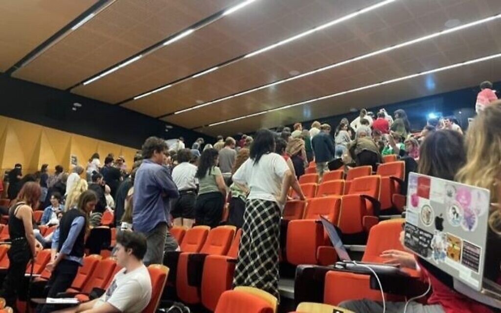 University of Sydney students turn their backs on Jewish speaker expressing concerns over anti-semitism. Pic: Twitter/X