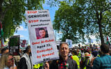 Peter Tatchell at Saturday’s Nakba Day march in London holding placard condemning Hamas and Israeli actions. Photo Credit: Peter Tatchell/X