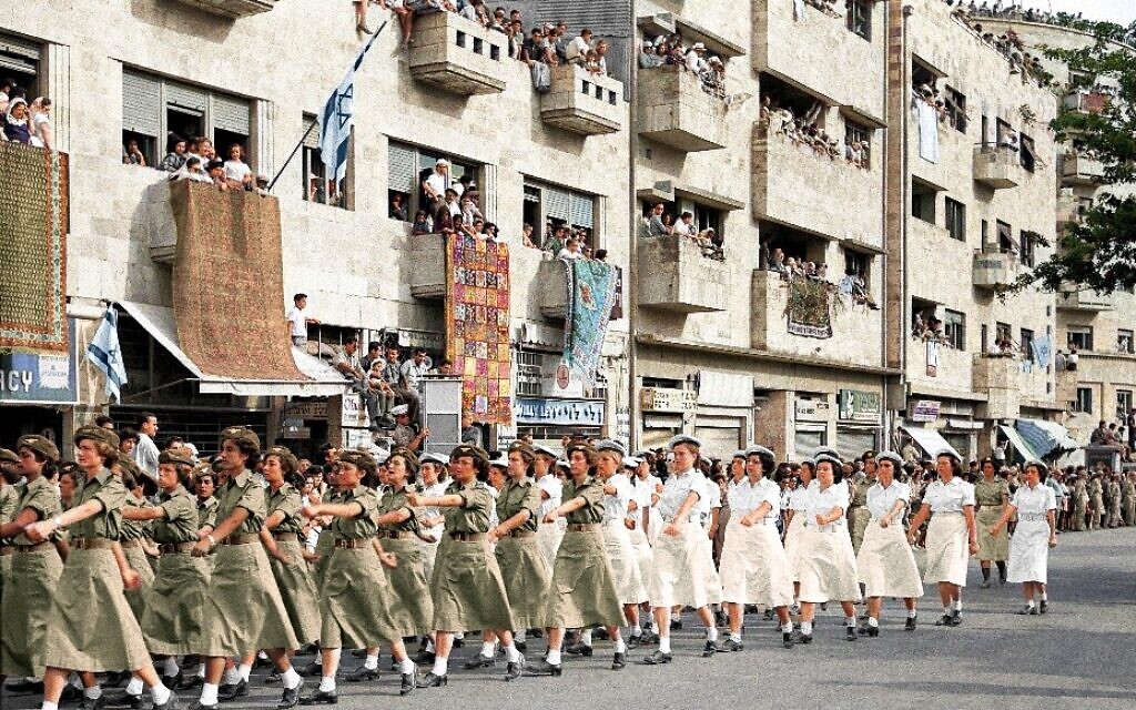 Israel's Third Independence Day Parade: Female soldiers march down King George Street during a military parade marking Israel's third Independence Day. Jerusalem, 1951.
Colourisation: Tamar Hayardeni Israel's Third Independence Day Parade: Female soldiers march down King George Street during a military parade marking Israel's third Independence Day. Jerusalem, 1951.
Colourisation: Tamar Hayardeni