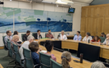 Uri Weltmann and Amin Amara address MPs and campaigners at Portcullis House. Photo Credit: Standing Together
