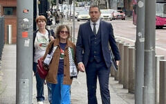 Sue Pentel arrives at Musgrave Street police station with her solicitor Padraig Ó Muirigh. Photo credit: Rebecca Black/PA Wire