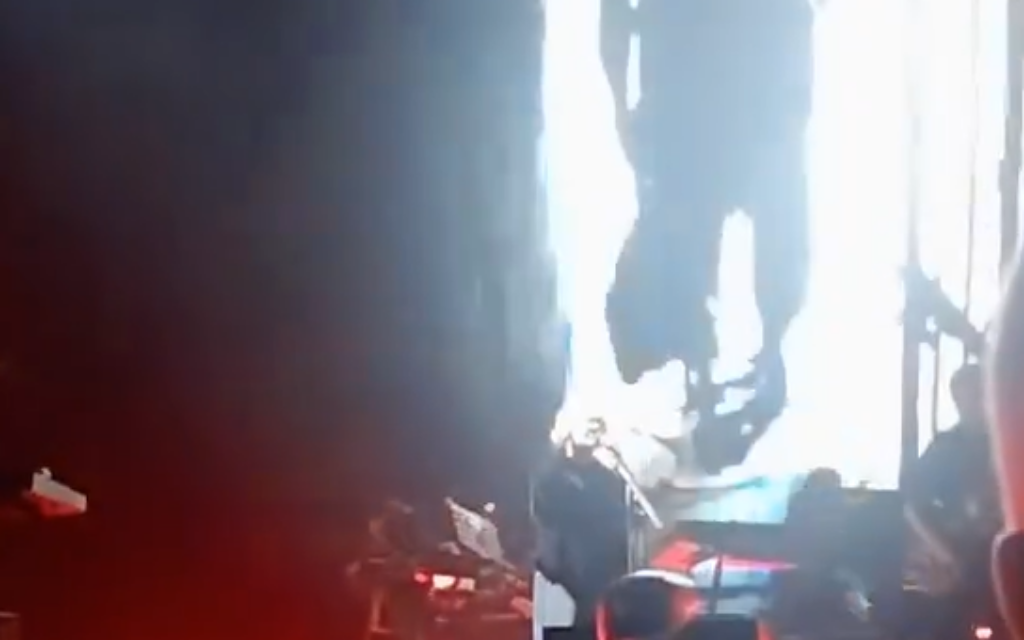 Footage of Hamas terrorist leader Yahya Sinwar in a tunnel under Gaza, shortly after the 7 October massacre, shown as part of a montage of images during Massive Attack's performance in Manchester.