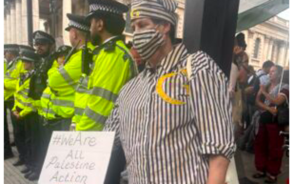 Palestine Action supporter dresses in concentration camp uniform at Trafalgar  Sq demo