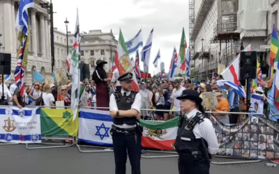 Police officers stand in front of Stop the Hate UK’s fenced-off counter-protest area on Waterloo Bridge.
Credit: Louis Errington/YouTube