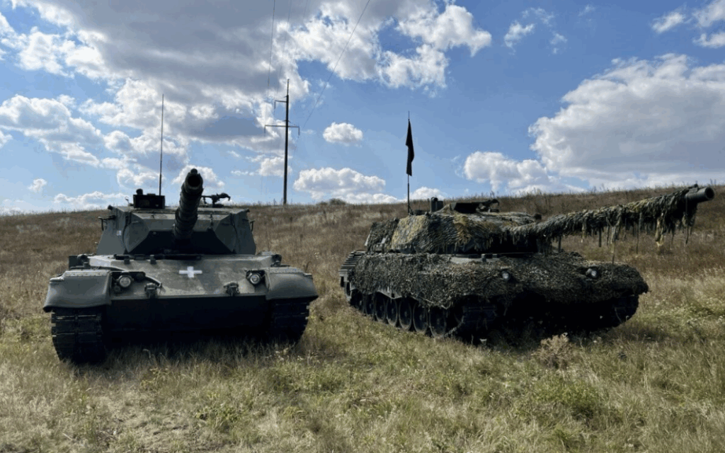 Two Leopard 1 tanks, of the sort supplied by OIP, in use in Ukraine (Credit: Wikimedia Commons/АрміяInform)