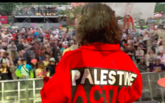 A Palestine Action member addresses a crowd from a Glastonbury stage, prior to the group's proscription as a terrorist organisation
