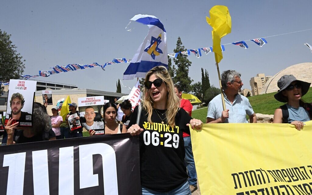 Families and supporters of Israeli hostages protest outside the office of Israeli Prime Minister Benjamin Netanyahu in Jerusalem, calling for him to secure the release of all hostages held captive in Gaza