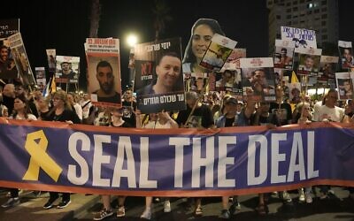 People take part in a protest in Tel Aviv demanding the end of the war and immediate release of hostages held by Hamas in the Gaza Strip, and against Prime Minister Benjamin Netanyahu's government in Tel Aviv, Saturday, July 26, 2025. (AP Photo/Mahmoud Illean)
