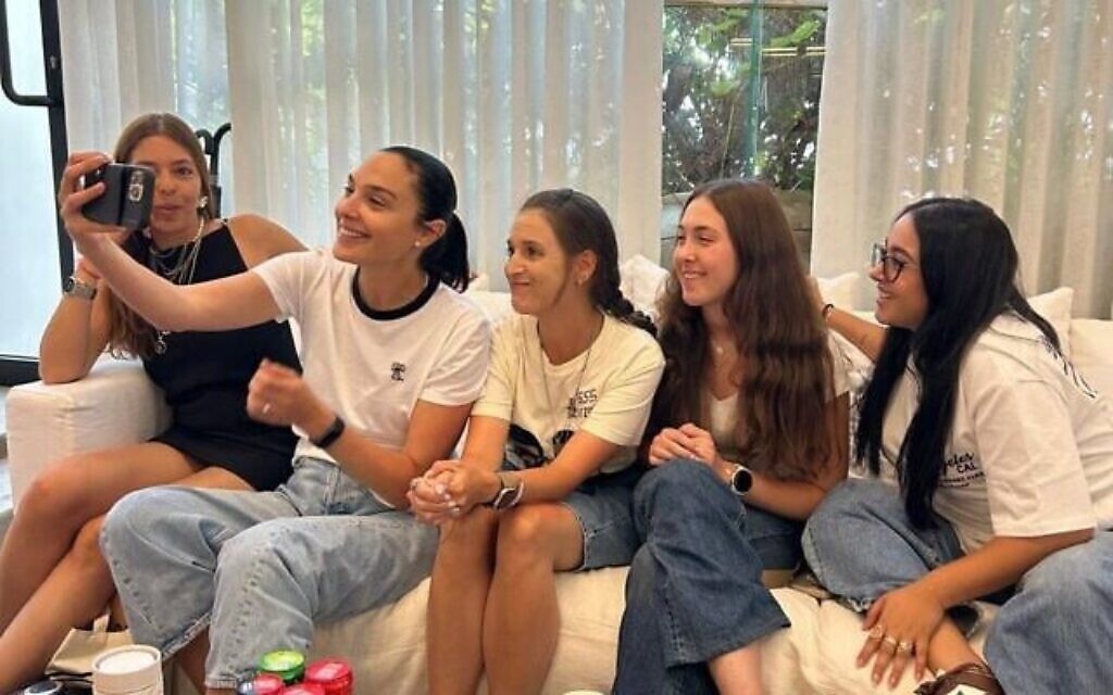 Gal Gadot (second from left) meets with freed hostages (from left) Moran Stela Yanai, Doron Steinbrecher, Naama Levy and Liri Albag. Photo Credit: Hostages Forum