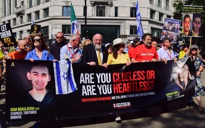 10th August. UK Chief Rabbi EPHRAIM MIRVIS and Israel supporters, including family members of hostages, march in the Strand to Downing Street demanding that all Israeli hostages held by Hamas in Gaza are released. Credit: Vuk Valcic/Alamy Live News