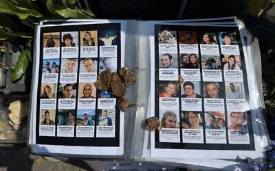Faeces smeared across the Brighton 7 October memorial book, covering victims’ photographs. Photo Credit: Heidi Bachram/X