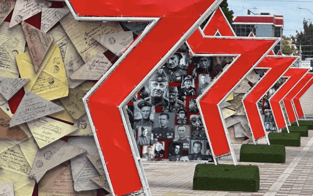 Enormous red stars containing patriotic images of World War II line the main boulevard of Tiraspol, capital of the breakaway region of Transnistria, as seen in June 2025. (Larry Luxner)