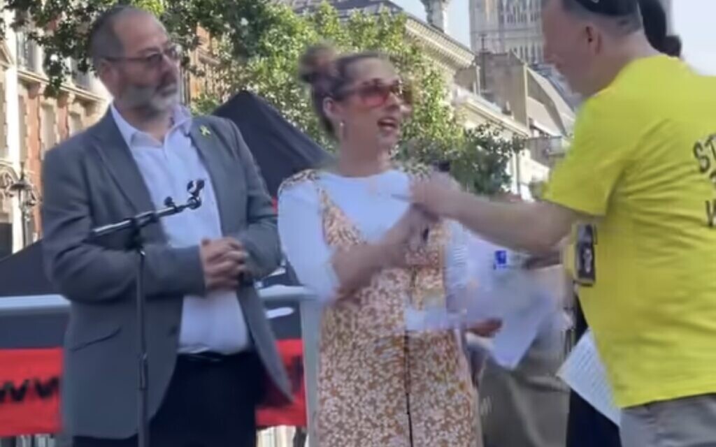 Co-heads of progressive Judaism Rabbis Charley Baginsky and Josh Levy are told to leave the stage by organisers at today's Downing St hostage protest.