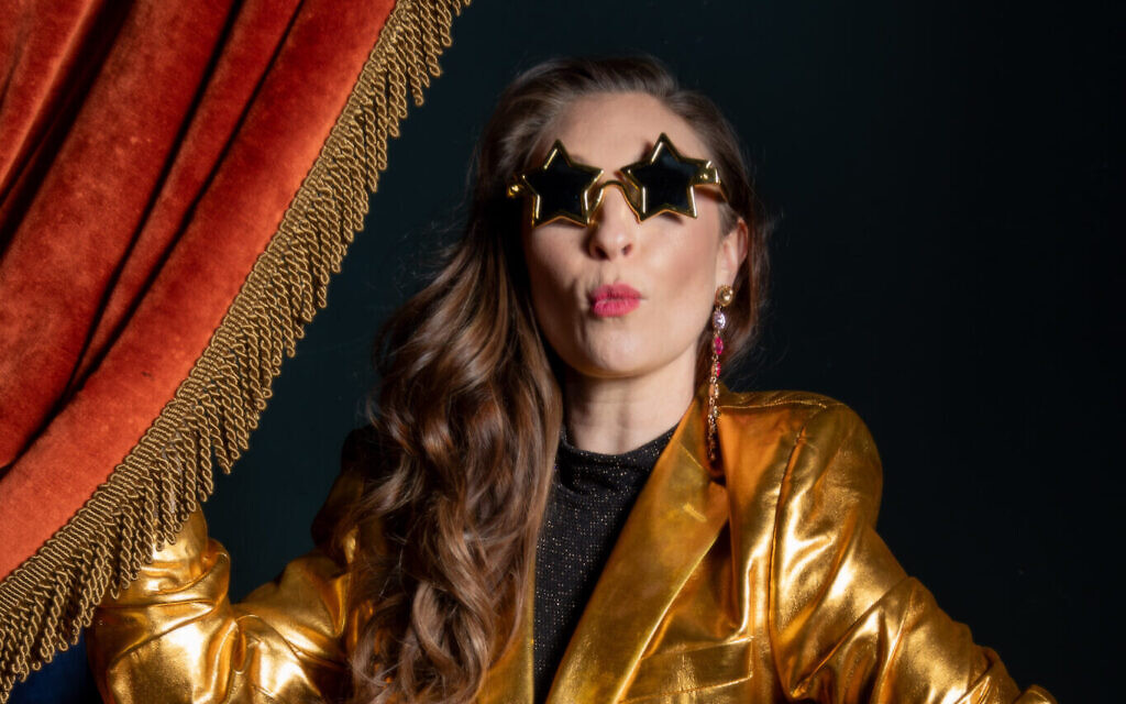 Jess Robinson as Elton John
