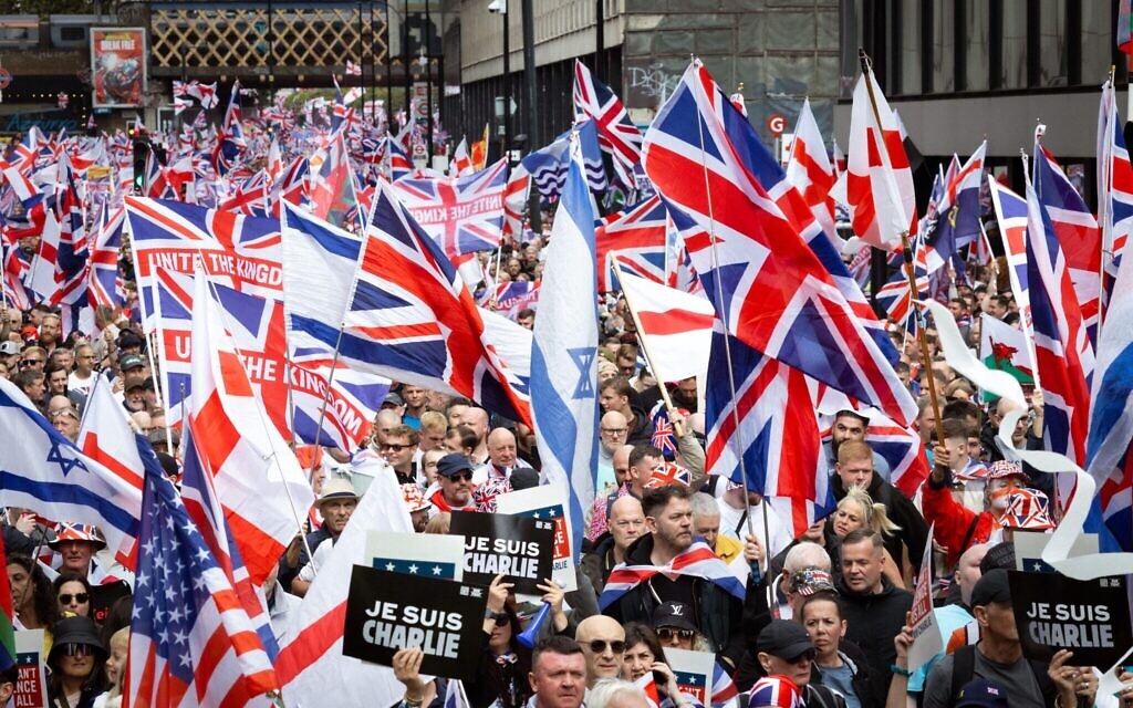 Thousands of people join Tommy Robinson's Unite The Kingdom march.