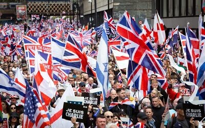 Thousands of people join Tommy Robinson's Unite The Kingdom march.
