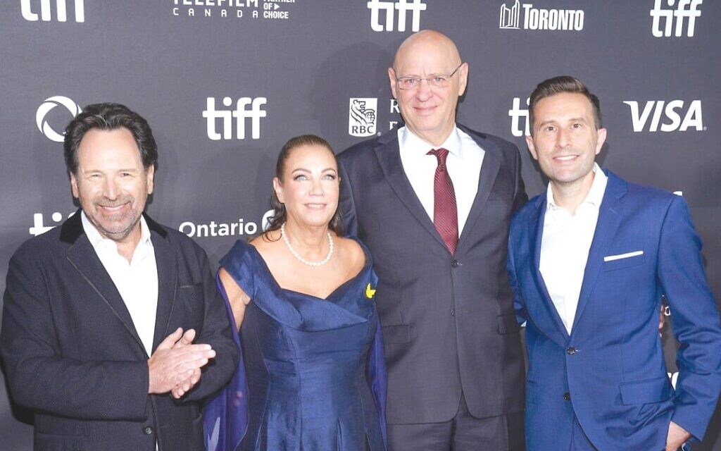 Director Barry Avrich (left) and producer Mark Selby (right) with guests at the Toronto International Film Festival premiere of The Road Between Us: The Ultimate Rescue. Credit: X