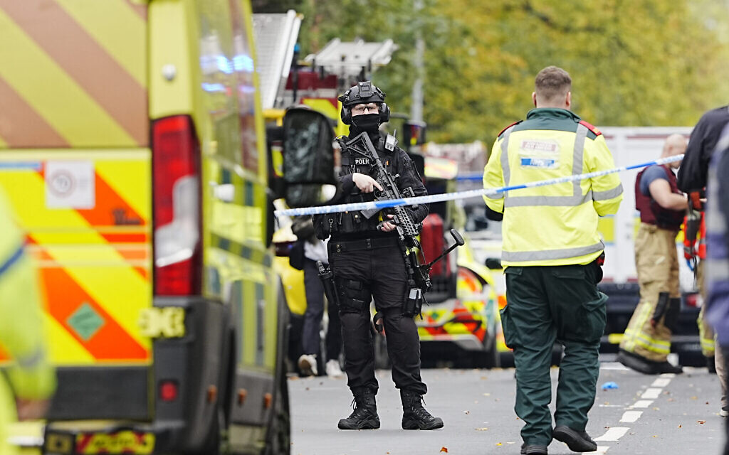 An armed police officer at the scene of an incident at Heaton Park Hebrew Congregation synagogue in Crumpsall, Manchester. PA Photo. Photo credit: Peter Byrne/PA Wire