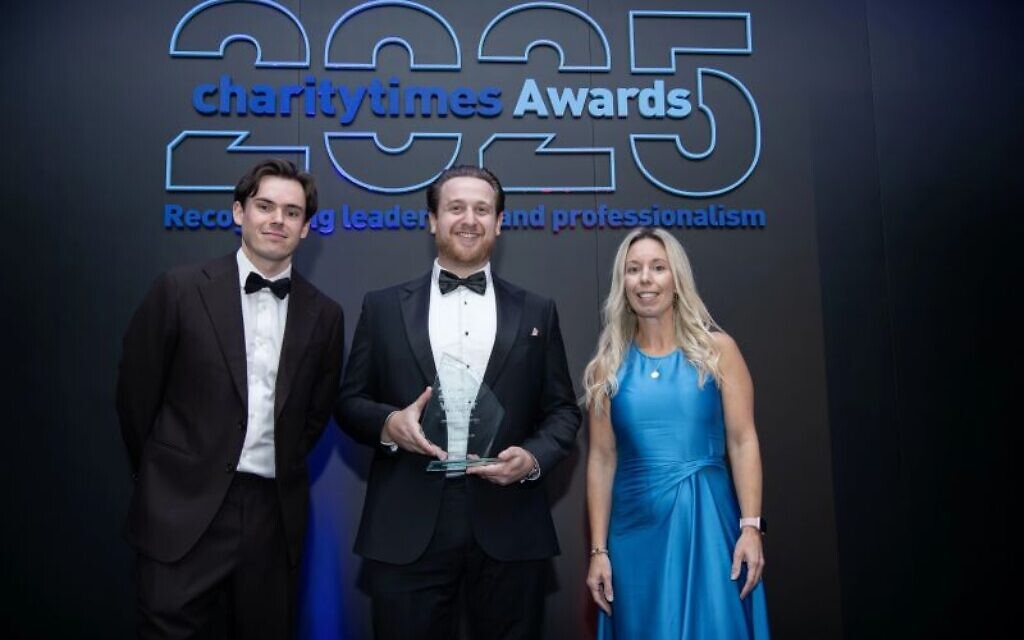 Bright Futures UK founder Joshua Pelled (centre) receiving the Charity of the Year 2025 award at the Charity Times Awards. Photo: Courtesy