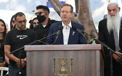 President Isaac Herzog delivers a eulogy for Yossi Sharabi at Kibbutz Be’eri, 27 October 2025. (Credit: GPO)