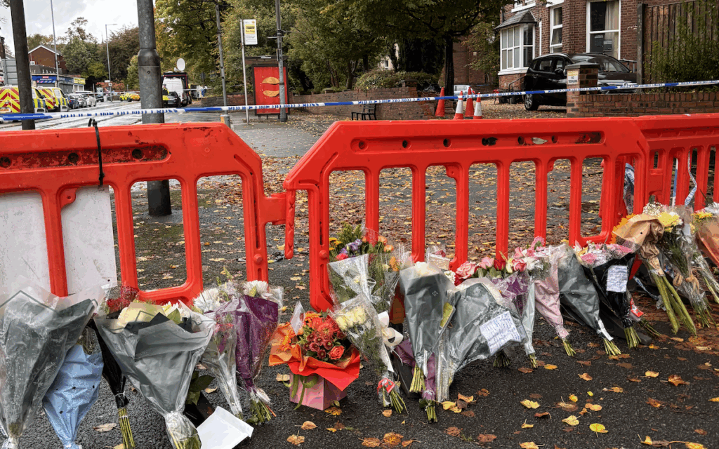 Floral tributes laid outside Heaton Park Synagogue in memory of the victims of the Yom Kippur attack.