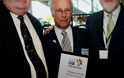 Jeffrey Pinnick receiving receiving an award for lifetime contribution to Holocaust remembrance at Yom HaShoah commemoration in 2016. It was presented by Lord Pickles and Henry Grunwald