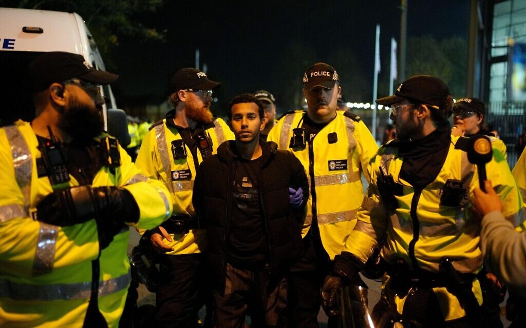 Police officers detain a pro-Palestine protester outside Villa Park, home of Aston Villa, during the UEFA Europa League match at Villa Park, Birmingham. The local Safety Advisory Group (SAG) opted to block Maccabi Tel Aviv supporters from attending tonight's Europa League tie against Aston Villa following a risk assessment by West Midlands Police, a decision which drew immediate criticism from politicians including Prime Minister Sir Keir Starmer. Picture date: Thursday November 6, 2025.