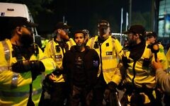 Police officers detain a pro-Palestine protester outside Villa Park, home of Aston Villa, during the UEFA Europa League match at Villa Park, Birmingham. The local Safety Advisory Group (SAG) opted to block Maccabi Tel Aviv supporters from attending tonight's Europa League tie against Aston Villa following a risk assessment by West Midlands Police, a decision which drew immediate criticism from politicians including Prime Minister Sir Keir Starmer. Picture date: Thursday November 6, 2025. Police officers detain a pro-Palestine protester outside Villa Park, home of Aston Villa, during the UEFA Europa League match at Villa Park, Birmingham. The local Safety Advisory Group (SAG) opted to block Maccabi Tel Aviv supporters from attending tonight's Europa League tie against Aston Villa following a risk assessment by West Midlands Police, a decision which drew immediate criticism from politicians including Prime Minister Sir Keir Starmer. Picture date: Thursday November 6, 2025.