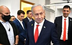 Israeli Prime Minister Benjamin Netanyahu arrives in a courtroom at the District Court in Tel Aviv, in the trial against him, Oct. 15, 2025. (Reuven Kastro/Pool/Flash90) Israeli Prime Minister Benjamin Netanyahu arrives in a courtroom at the District Court in Tel Aviv, in the trial against him, Oct. 15, 2025. (Reuven Kastro/Pool/Flash90)