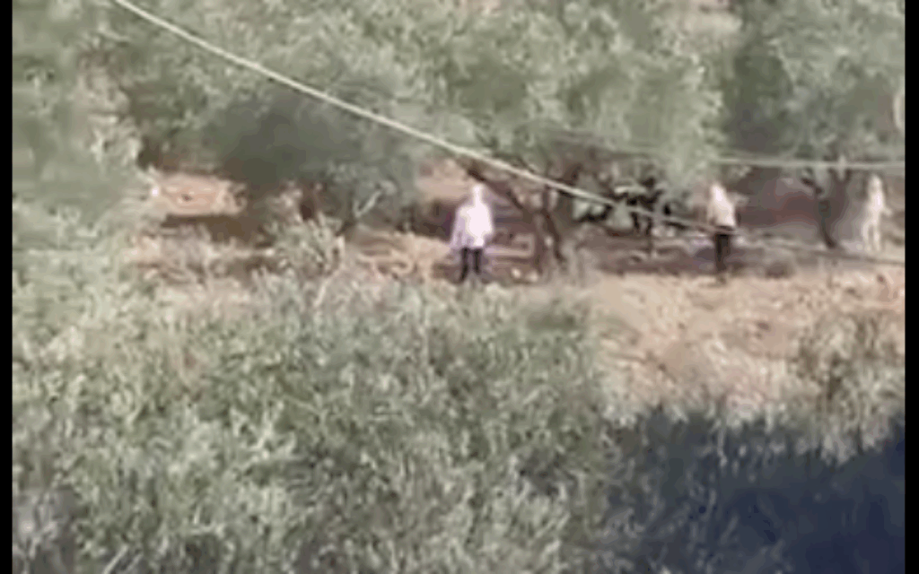 Settlers in Beita, in the West Bank