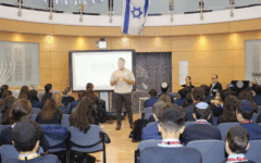 Eytan, a wounded IDF veteran now supported by Beit Halochem, speaks to students during a UK school visit organised by Beit Halochem UK. Eytan, a wounded IDF veteran now supported by Beit Halochem, speaks to students during a UK school visit organised by Beit Halochem UK.