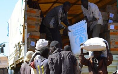 Food aid is delivered to displaced people in Zamzam camp in North Darfur. Photo Credit: WFP/Mohamed Galal