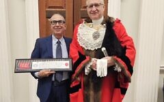 Sir David Khalili receives the Freedom of the City of London from Lord Mayor Alastair King at Guildhall.