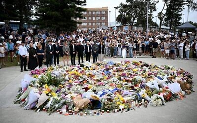 Australia in mourning after gunmen opened fire on Bondi Beach, killing 15 people in an attack designed to target the Jewish community. (AAP Image/Bianca De Marchi) Credit: Australian Associated Press/Alamy Live News
