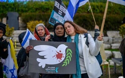 Israeli and Palestinian peace activists demonstrate solidarity, calling for coexistence and an end to violence. Photo: Gal Mosenson, Kiryat Tivon, 22 Februrary, 2024